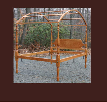 sheraton field bed in cherry with acorn post and bowed tester frame